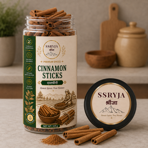 A jar of SSRYJA Cinnamon Sticks with several sticks scattered in front, alongside the lid placed beside the jar. The setting is a warm, softly blurred kitchen-like environment with wooden props in the background.