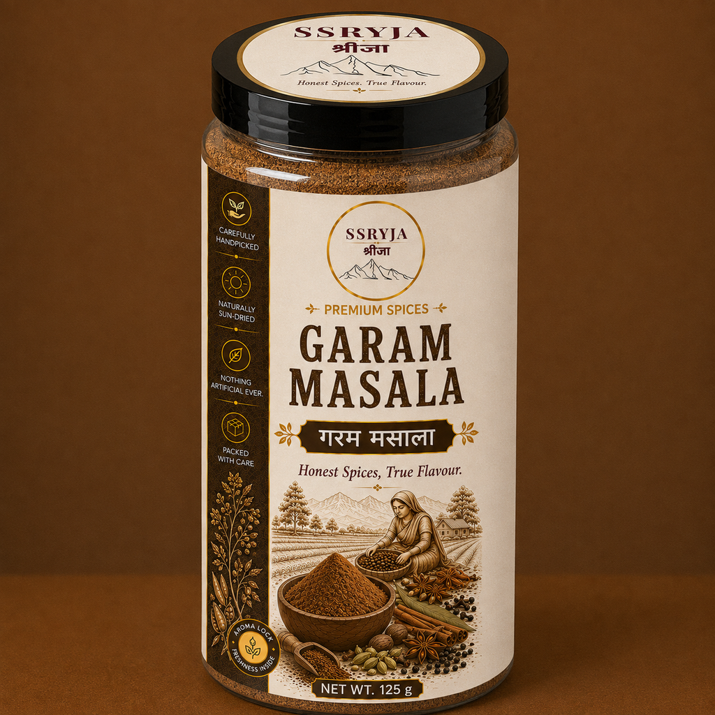 A jar of SSRYJA Garam Masala spice mix on a solid brown background. The jar has a cream-colored label with dark brown text and illustrations of spices, and a black lid with the SSRYJA brand logo.